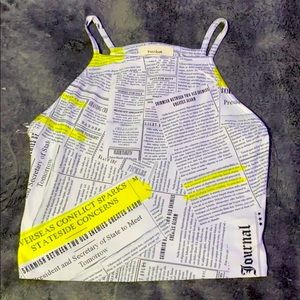 white and yellow newspaper shirt